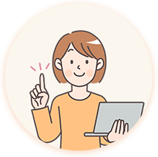 パソコンを持って指さしている女性
